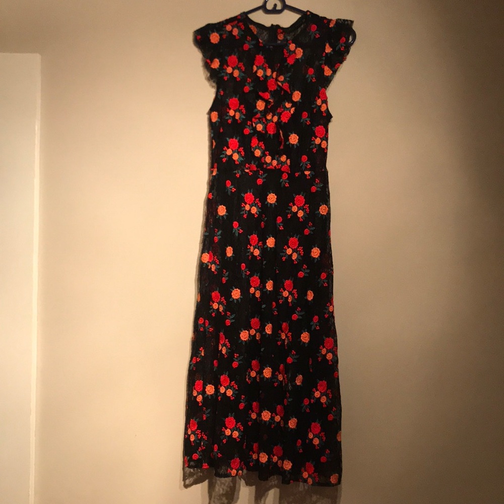 Black lace dress with red flowers.